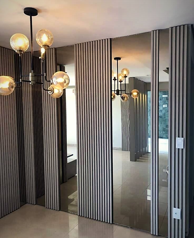 Fluted panels with mirror wall